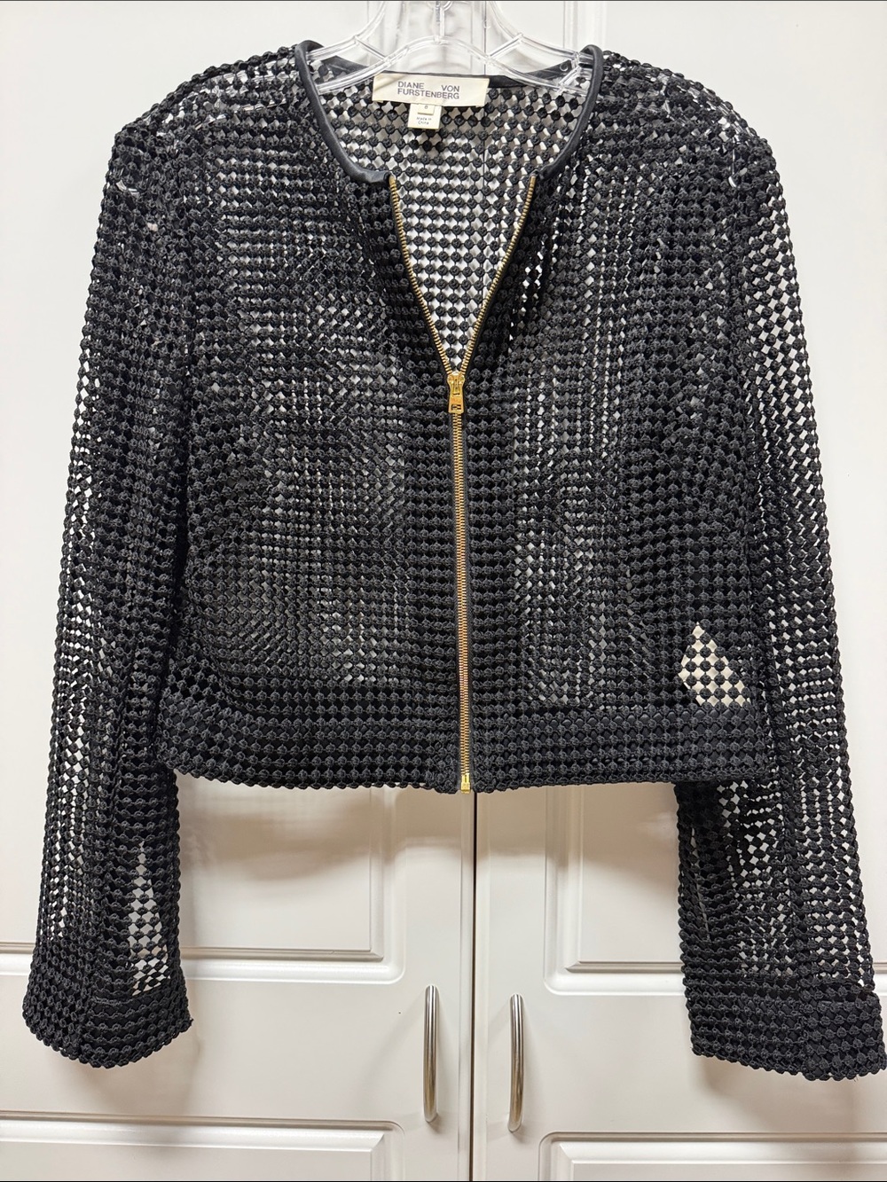 Diane Von Furstenberg Black Chain Lace Zip-Front Jacket with Gold Hardware.